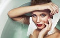 Portrait of a beautiful glamourous blonde in water, beauty spa c Royalty Free Stock Photo