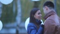 Portrait of beautiful guy and girl in park. Declaration of Love. romantic date in the park.