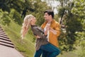 Portrait of beautiful handsome adorable cheerful spouses dancing spending enjoying weekend sunny day outdoors