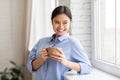 Portrait of beautiful happy asian woman drinking coffee Royalty Free Stock Photo