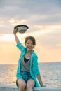 Portrait of beautiful and happy emotion teenager wearing straw h