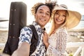 Portrait Of beautiful happy multiracial couple having fun together on the beach. Leisure time. Summer Royalty Free Stock Photo