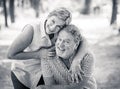 Portrait of a beautiful happy senior couple in love relaxing in the park Royalty Free Stock Photo