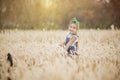 Portrait of beautiful happy smiling girl to meadow in nature on sunny day Royalty Free Stock Photo