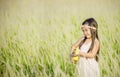 Portrait of beautiful happy smiling girl to meadow in nature on sunny day Royalty Free Stock Photo