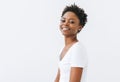 Portrait of beautiful happy young African American woman in white t-shirt isolated on white background Royalty Free Stock Photo