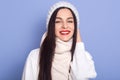 Portrait of beautiful happy young woman with happy facial expression, girl with long dark hair and red lips. Smiling girl wears Royalty Free Stock Photo