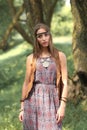 Beautiful hippie girl on spring forest background Royalty Free Stock Photo