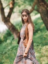 Beautiful hippie girl on spring forest background Royalty Free Stock Photo