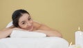 Portrait Of Beautiful Indain Woman Lying On Massage Table In Spa Salon Royalty Free Stock Photo