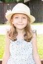 Portrait of a beautiful liitle girl with hat