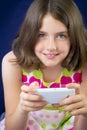 Portrait of beautiful little girl with cell phone Royalty Free Stock Photo