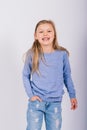 Portrait of beautiful little girl happy smiling on studio. Isolated white background Royalty Free Stock Photo