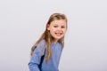 Portrait of beautiful little girl happy smiling on studio. Isolated white background Royalty Free Stock Photo