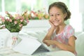 Portrait of beautiful little girl with tablet pc Royalty Free Stock Photo