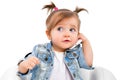 Portrait of a beautiful little girl, talking on the phone Royalty Free Stock Photo