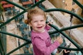 Portrait of beautiful little toddler girl in summer look clothes standing on balcony in Venice, Italy. Royalty Free Stock Photo