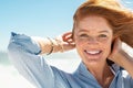 Smiling mature woman at beach Royalty Free Stock Photo