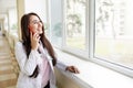 Portrait of a beautiful medical doctor talking on the phone. medical concept Royalty Free Stock Photo