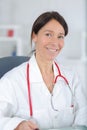 Portrait beautiful middle aged female doctor smiling Royalty Free Stock Photo