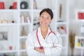 Portrait beautiful middle aged female doctor smiling Royalty Free Stock Photo