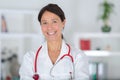 Portrait beautiful middle aged female doctor smiling Royalty Free Stock Photo