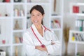 Portrait beautiful middle aged female doctor smiling Royalty Free Stock Photo