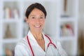 Portrait beautiful middle aged female doctor smiling Royalty Free Stock Photo