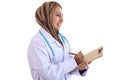 Portrait of beautiful middle aged smiling Asian Muslim woman doctor with holding doctor stethoscope wearing traditional hijab Royalty Free Stock Photo