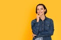 Portrait Of Beautiful Middle Aged Woman Posing Over Yellow Background In Studio Royalty Free Stock Photo