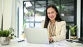 A businesswoman or female accountant sits at her office desk in the office Royalty Free Stock Photo