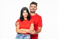 Portrait of beautiful mixed race couple, embracing, smiling, looking at camera background Royalty Free Stock Photo