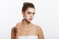 Portrait beautiful naked woman apply cosmetic white clay mask on with brush. Isolated on a white background. concept of Royalty Free Stock Photo