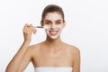 Portrait beautiful naked woman apply cosmetic white clay mask on with brush. Isolated on a white background. concept of Royalty Free Stock Photo