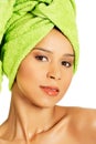 Portrait of beautiful naked woman with turban. Royalty Free Stock Photo