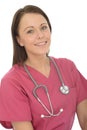 Portrait Of A Beautiful Natural Young Female Doctor Smiling with a Stethoscope Royalty Free Stock Photo