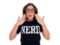 Portrait of beautiful nerd woman with eyeglasses looking shocked