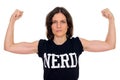 Portrait of beautiful nerd woman flexing muscles