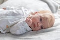 Beautiful newborn boy is resting on a blanket Royalty Free Stock Photo