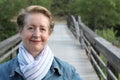 Portrait of a beautiful older woman smiling in the park Royalty Free Stock Photo