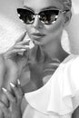 Portrait beautiful phenomenal stunning elegant blonde model woman with perfect face wearing a sunglasses Royalty Free Stock Photo