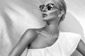 Portrait beautiful phenomenal stunning elegant blonde model woman with perfect face wearing a sunglasses Royalty Free Stock Photo