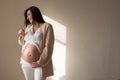 Portrait of beautiful pregnant woman home before childbirth Royalty Free Stock Photo