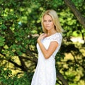 Portrait of a beautiful pretty girl in summer park Royalty Free Stock Photo