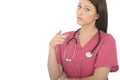 Portrait Of A Beautiful Professional Serious Young Female Doctor Pointing in Disappointment Royalty Free Stock Photo