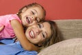 Portrait of beautiful real mother and daughter hugging