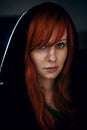 Portrait of beautiful red hair woman in black Royalty Free Stock Photo