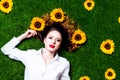 Portrait of beautiful red-haired girl with sunflowers Royalty Free Stock Photo