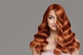 Portrait of beautiful redhair young woman. Wavy hairstyle