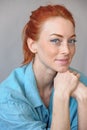 Beautiful redhead freckled cheerful woman smiling thoughtful Royalty Free Stock Photo